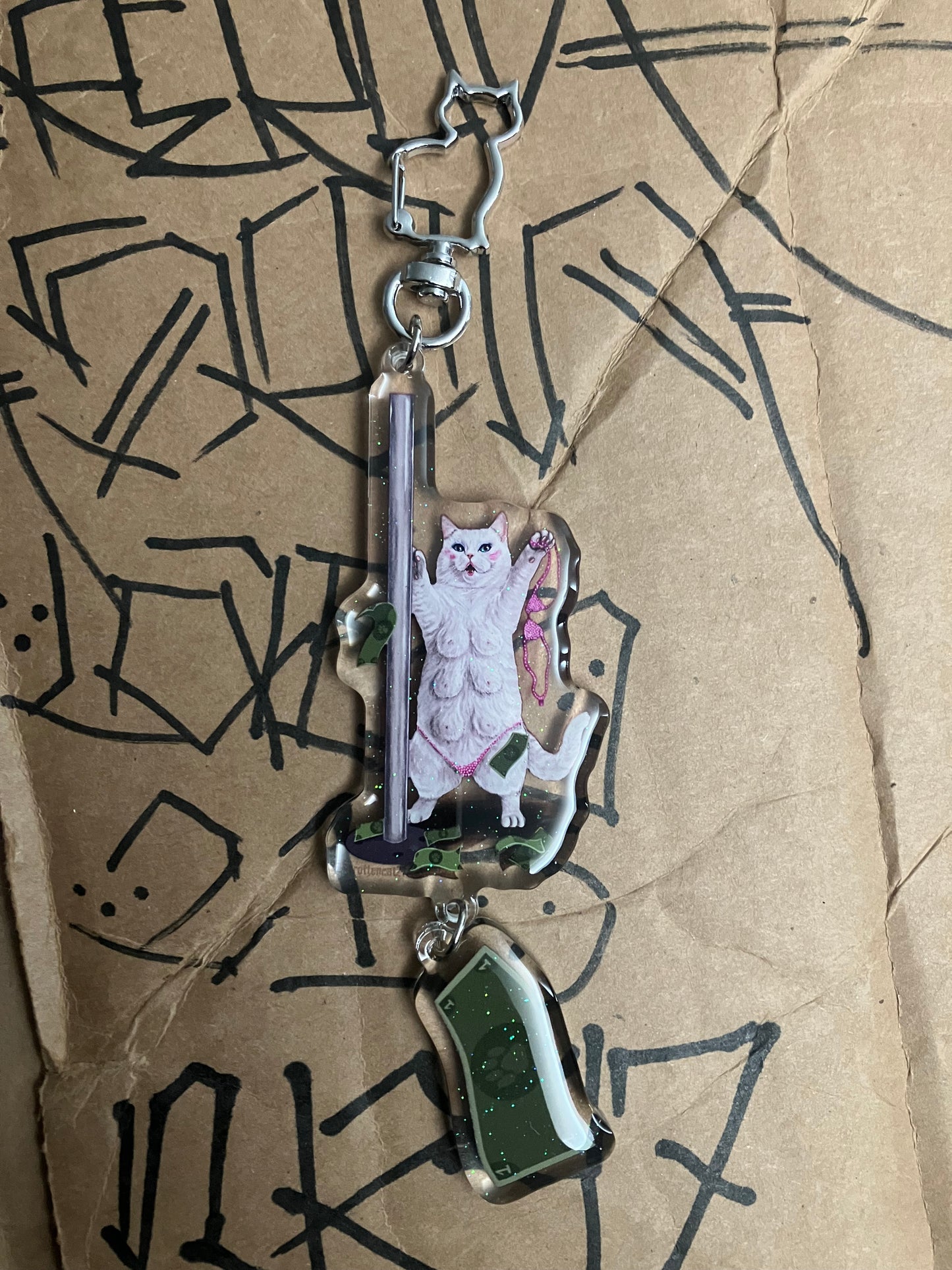 Plastic titty kitty keychain